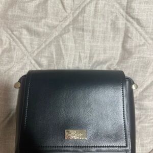 Kate Spade Black Backpack Sleek Design